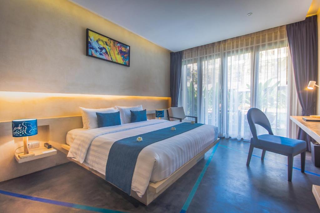Postel nebo postele na pokoji v ubytování Sakmut Boutique Hotel