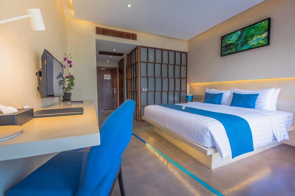 Postel nebo postele na pokoji v ubytování Sakmut Boutique Hotel