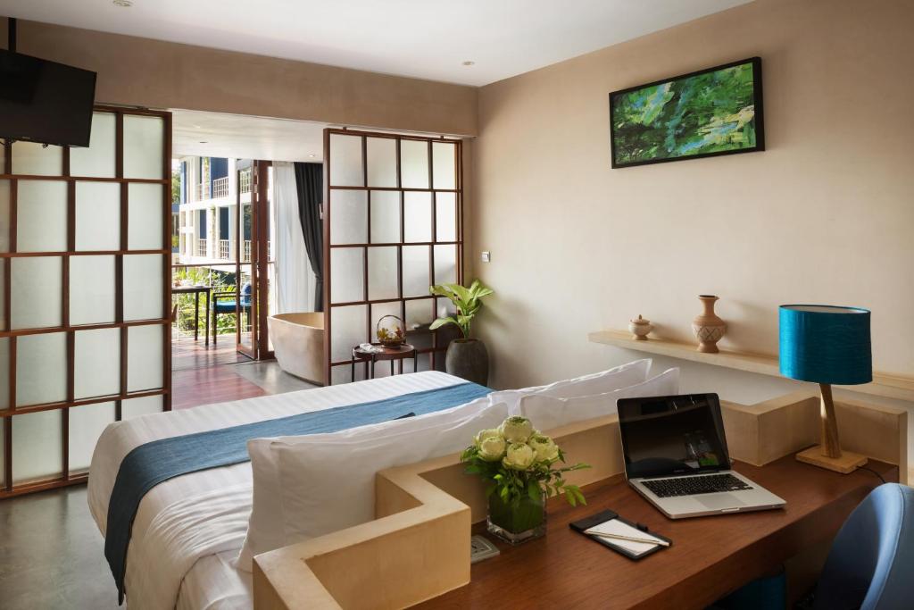 TV a/nebo společenská místnost v ubytování Sakmut Boutique Hotel