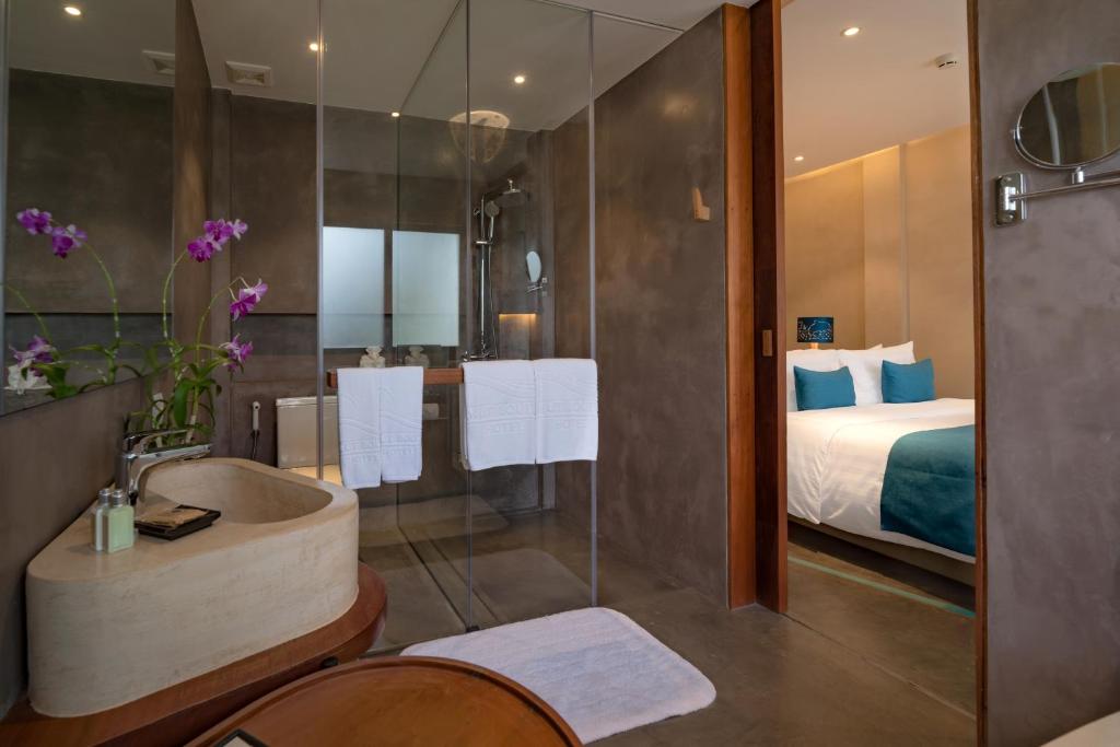Postel nebo postele na pokoji v ubytování Sakmut Boutique Hotel