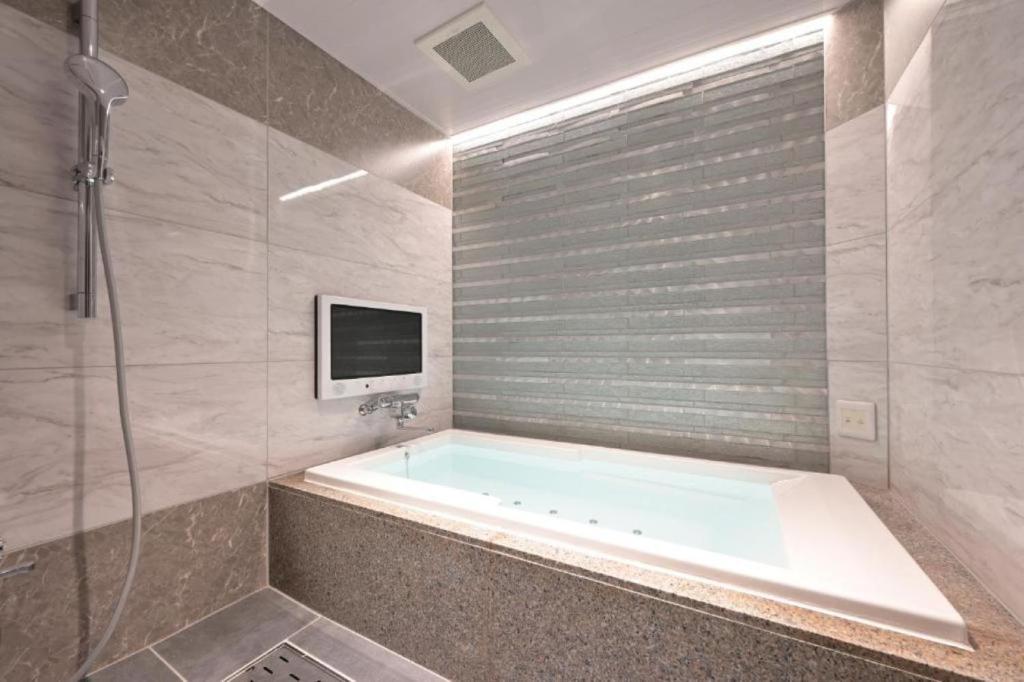 Vannituba majutusasutuses Hotel Pasadena 食べ放題飲み放題 - Couple Hotel