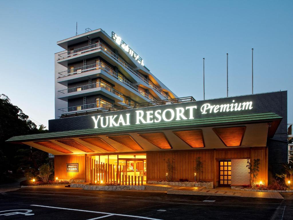 a building with a sign that reads yuana resort convention at Yukai Resort Premium Shirahama Saichoraku in Shirahama
