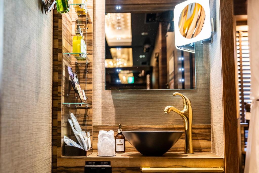 Koupelna v ubytování Petit Bali Forest Shinjuku Sanchōme