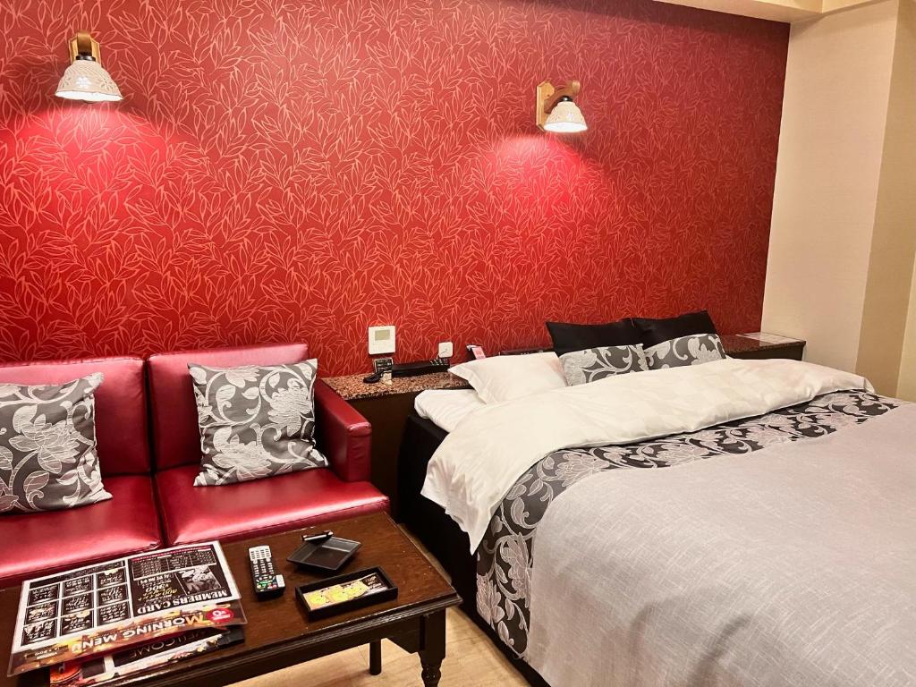 Postel nebo postele na pokoji v ubytování Hotel Crystal Gate Nagoya - Couple Hotel