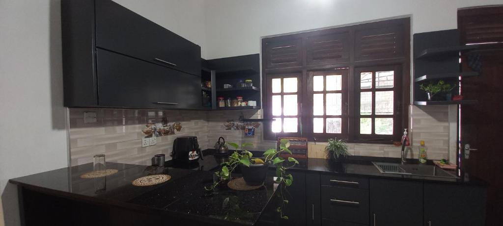 Kuchyň nebo kuchyňský kout v ubytování Abinu"s Place