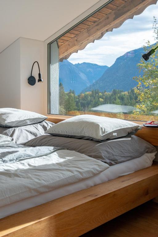 Postel nebo postele na pokoji v ubytování 12er Loft