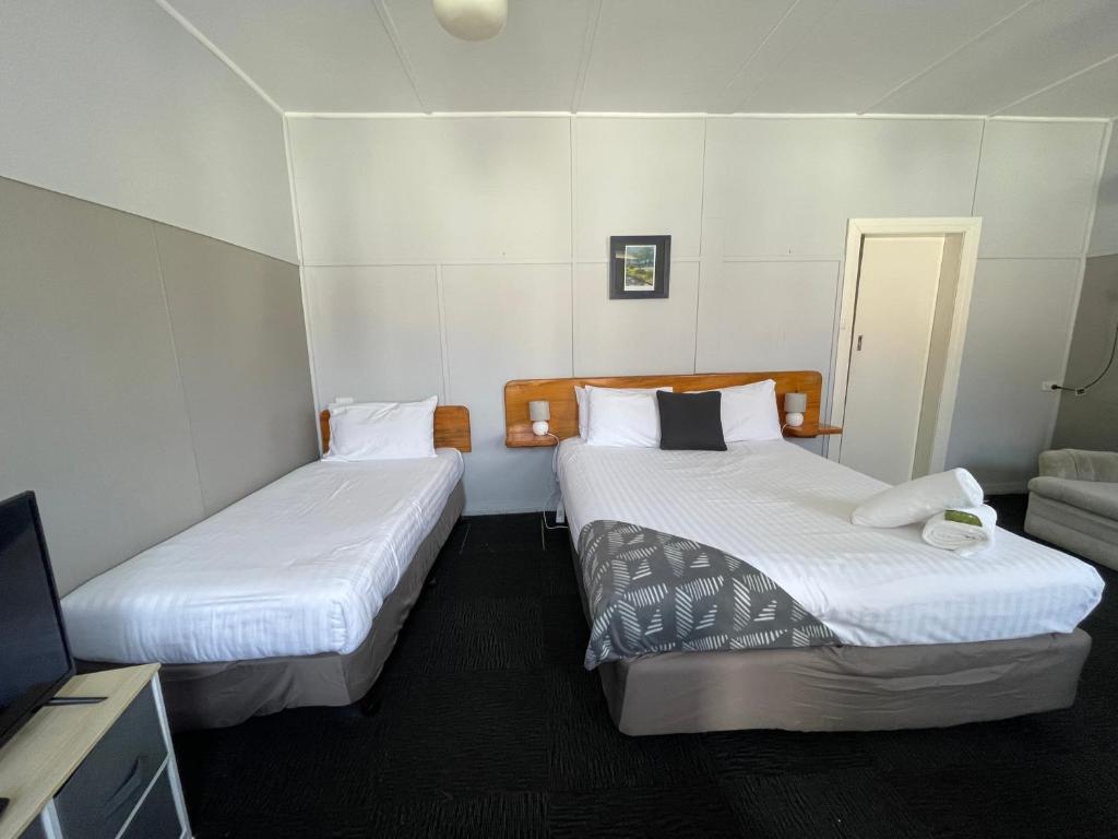 Postel nebo postele na pokoji v ubytování Mountain View Motel