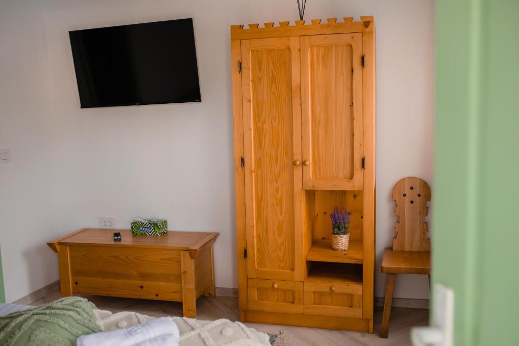 Postel nebo postele na pokoji v ubytování Casa Izvoarele