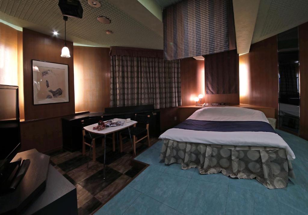 Postel nebo postele na pokoji v ubytování Hotel Mio Seki Adult Only