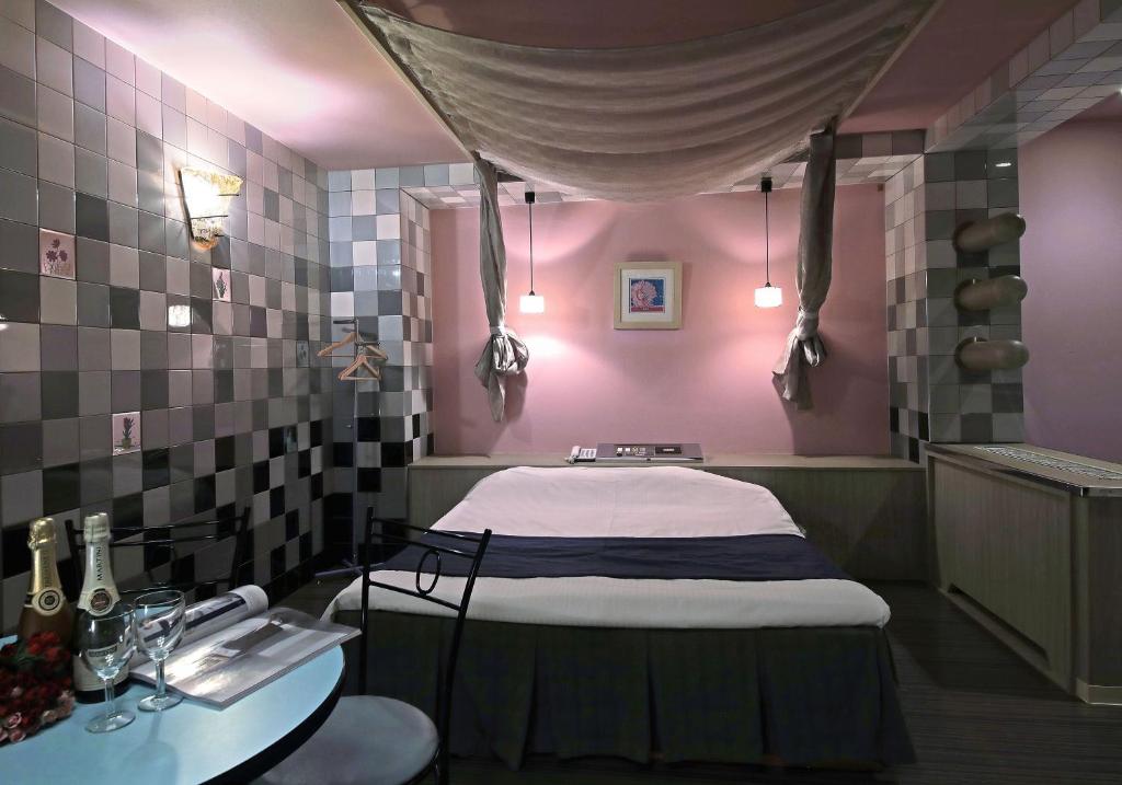 Postel nebo postele na pokoji v ubytování Hotel Mio Seki Adult Only