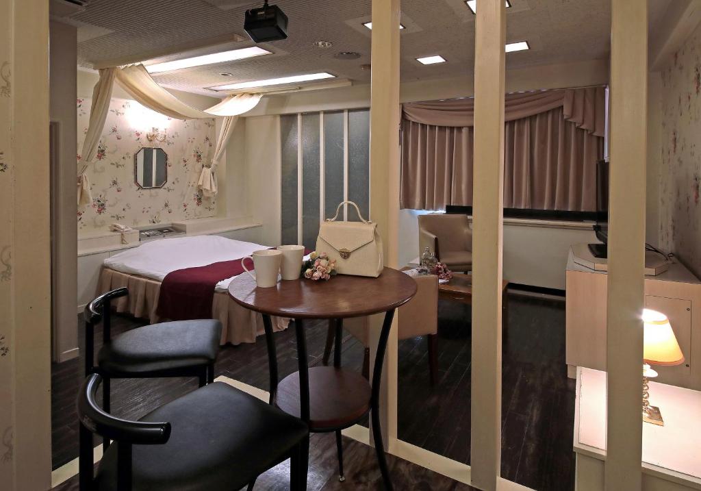 Postel nebo postele na pokoji v ubytování Hotel Mio Seki Adult Only