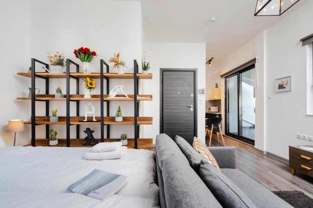 A bed or beds in a room at Kula apartments City center Exarchia