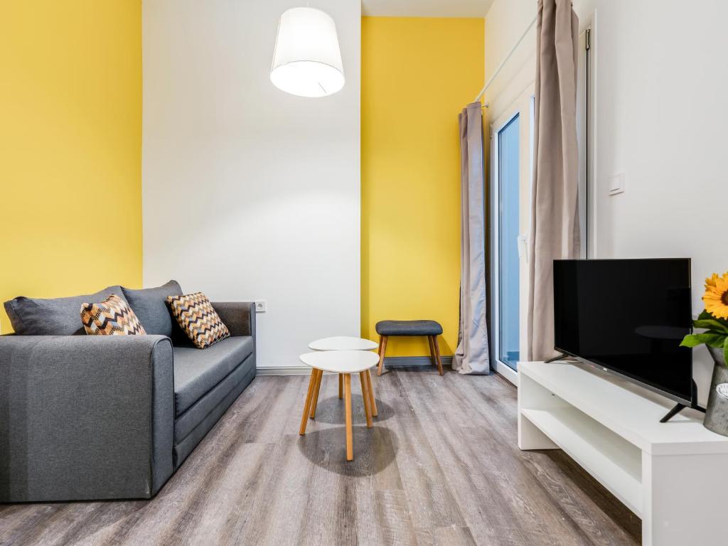 A television and/or entertainment centre at Kula apartments City center Exarchia