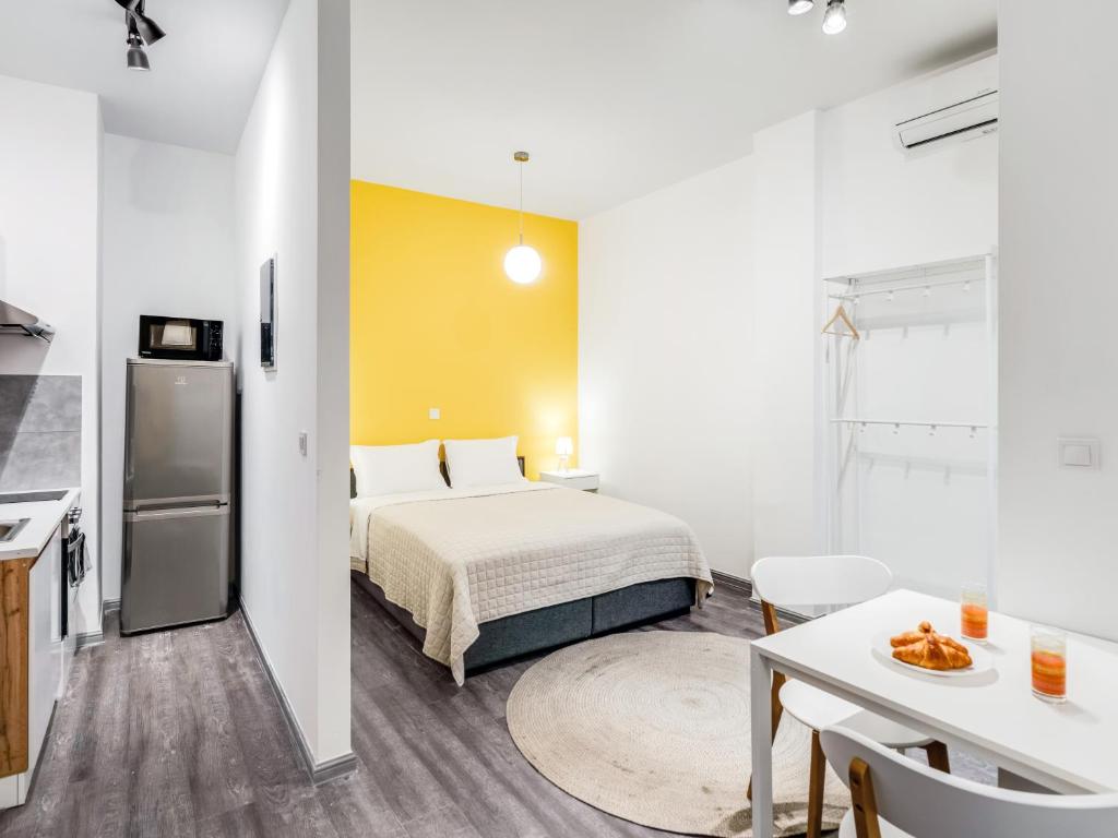 A bed or beds in a room at Kula apartments City center Exarchia