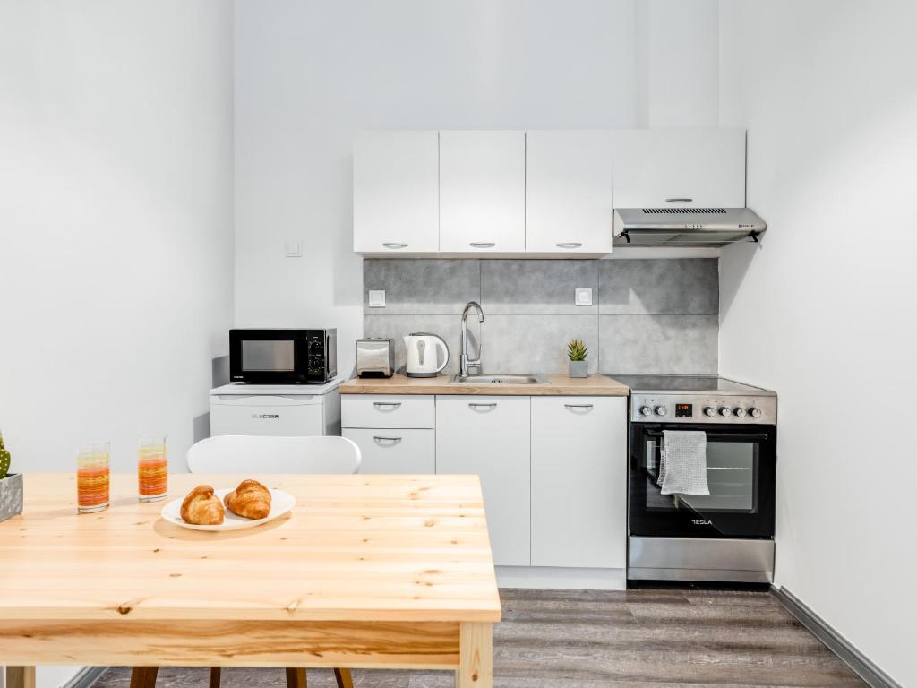 A kitchen or kitchenette at Kula apartments City center Exarchia