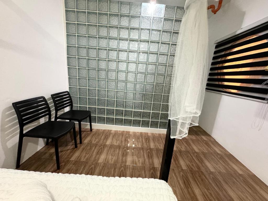 Postel nebo postele na pokoji v ubytování Mahajab Homestay SIARGAO