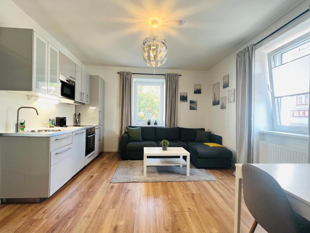 Kuchyň nebo kuchyňský kout v ubytování White Inn - Kuschelige Ferienwohnung