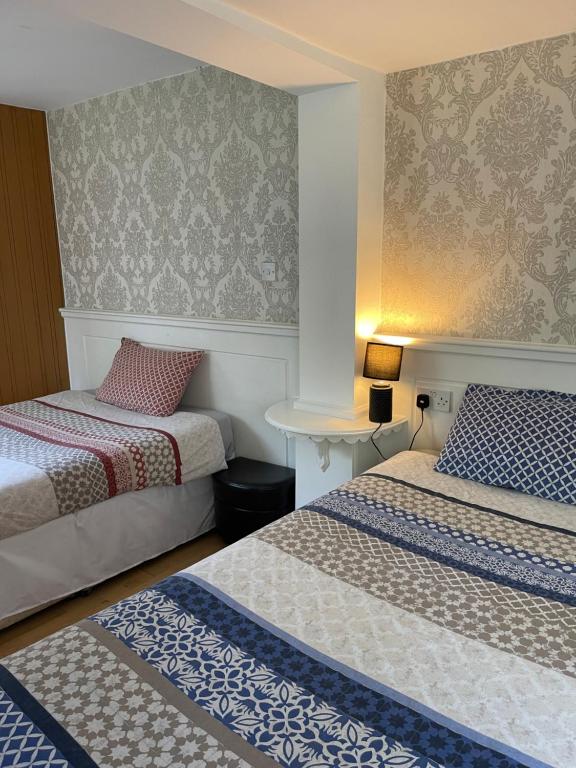 Ένα ή περισσότερα κρεβάτια σε δωμάτιο στο Bramley House
