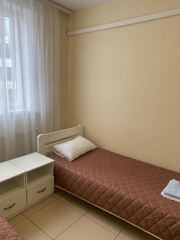 Postel nebo postele na pokoji v ubytování Dinamo