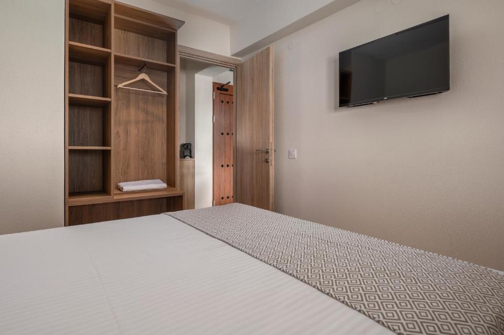 Postel nebo postele na pokoji v ubytování Esperanza Villas