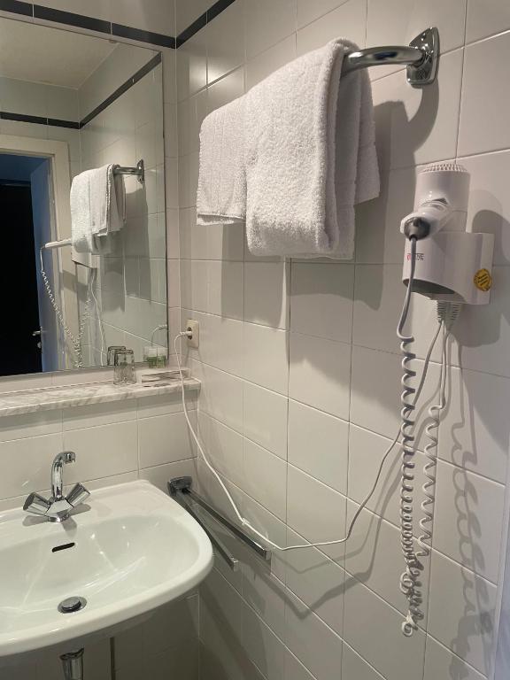 Koupelna v ubytování Hotel Bitterfelder Hof