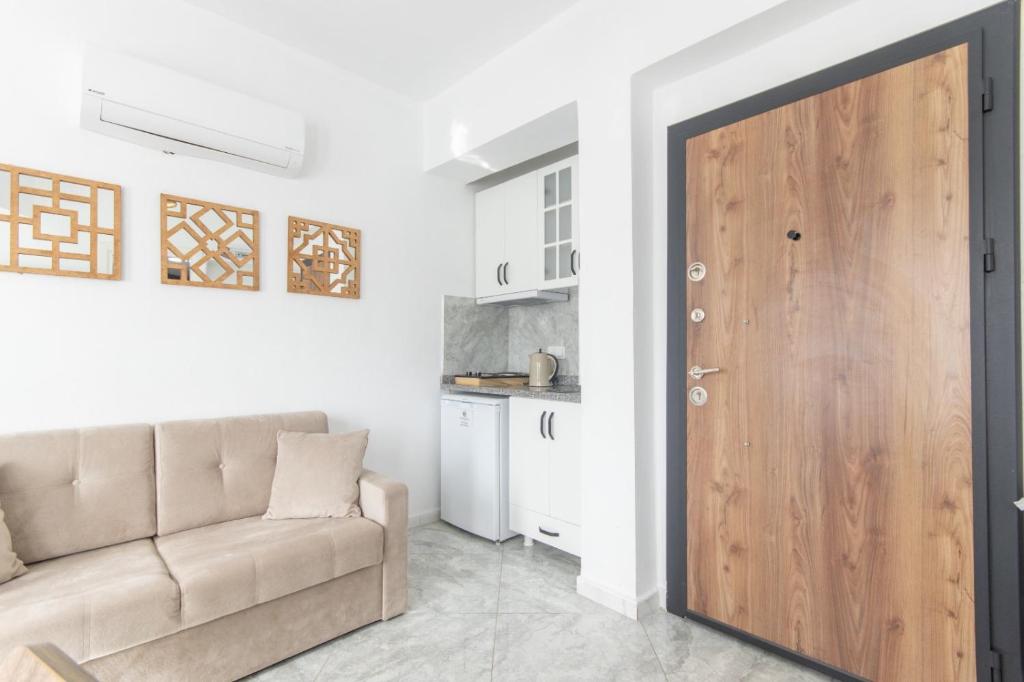 Kuchyň nebo kuchyňský kout v ubytování Gokceada Marmaros Butik Otel