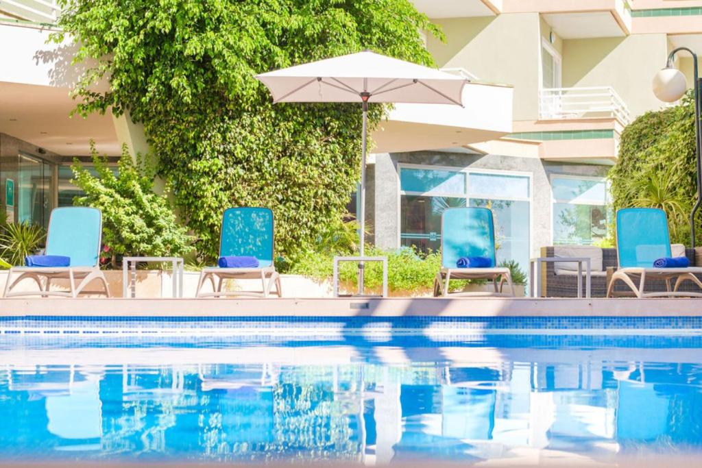 Bazén v ubytování Hotel Agua Beach "Adults only" nebo v jeho okolí