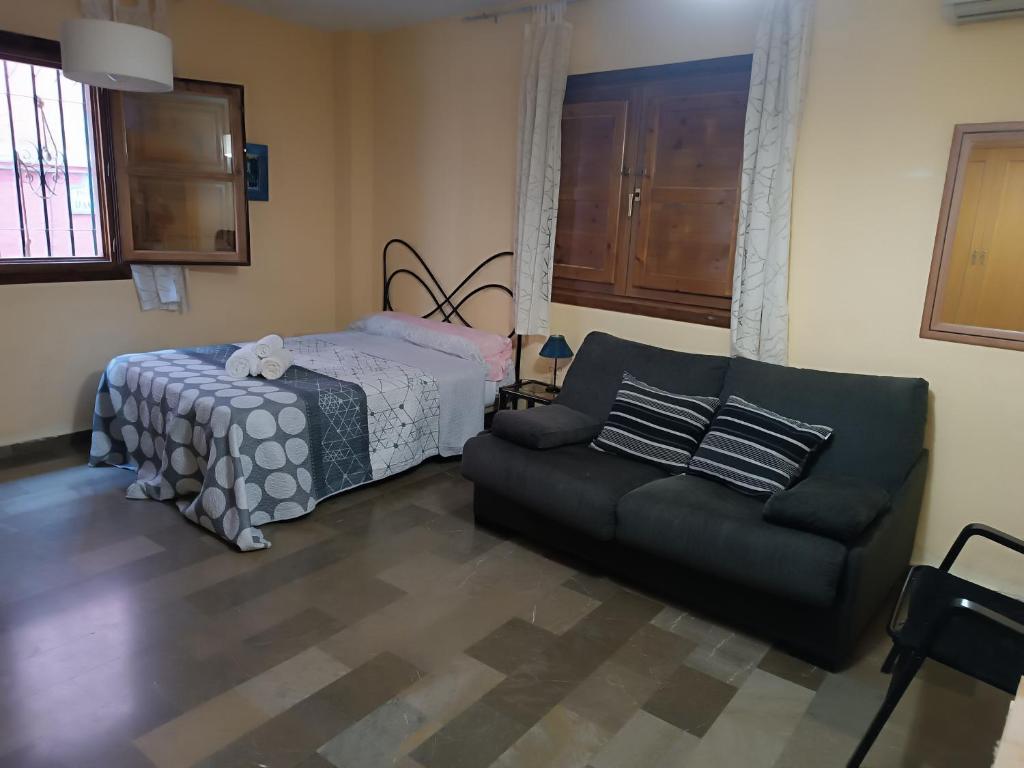 Posteľ alebo postele v izbe v ubytovaní Céntrico estudio en Granada