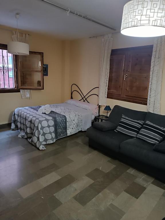 Posteľ alebo postele v izbe v ubytovaní Céntrico estudio en Granada