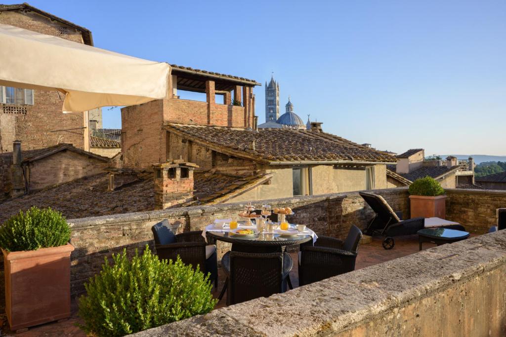 Balkón nebo terasa v ubytování Grand Hotel Continental Siena - Starhotels Collezione