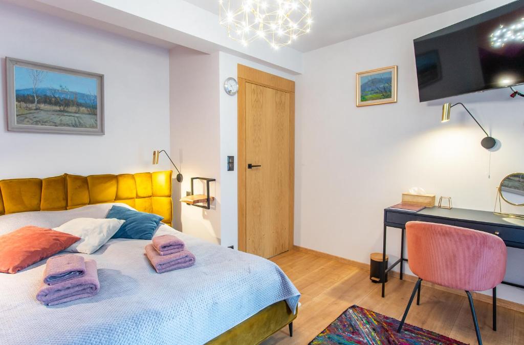 Posteľ alebo postele v izbe v ubytovaní Apartament 3 Strążyska 21A
