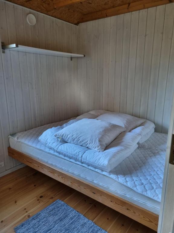 Postel nebo postele na pokoji v ubytování Rødvig Ferieby
