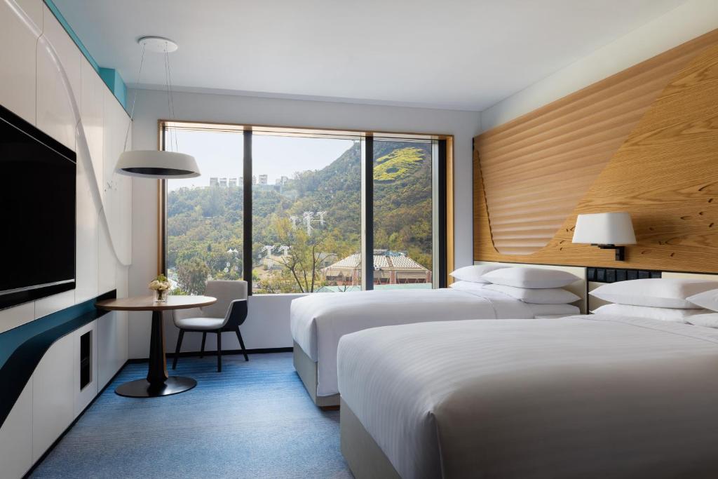 Letto o letti in una camera di Hong Kong Ocean Park Marriott Hotel