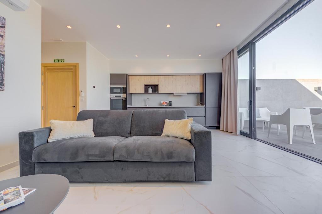 Kuchyň nebo kuchyňský kout v ubytování Mayfair by Premier Suites MT