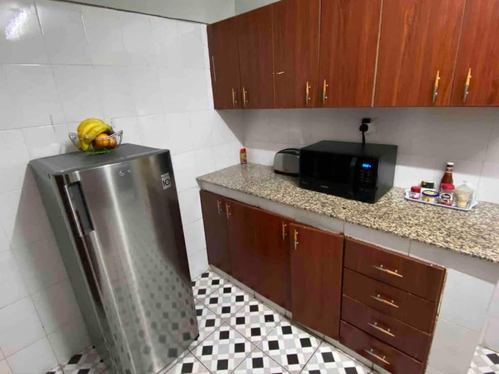 Kuchyň nebo kuchyňský kout v ubytování Milimani Suites With Pool, GYM, Secure Parking