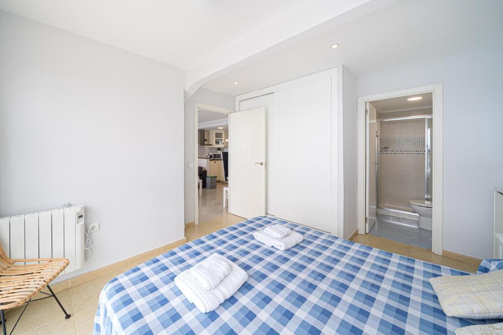 Postel nebo postele na pokoji v ubytování Apartamento Avenida Madrid