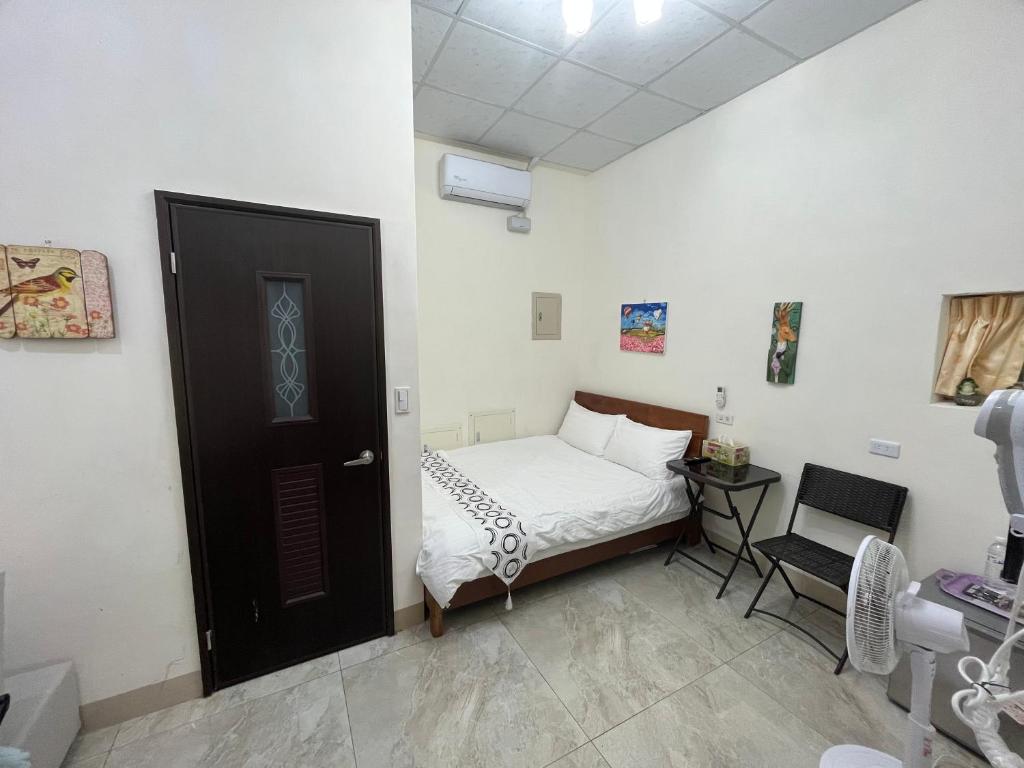 Postel nebo postele na pokoji v ubytování Happy B&B