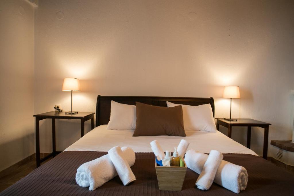 Postel nebo postele na pokoji v ubytování Enastron Guesthouse