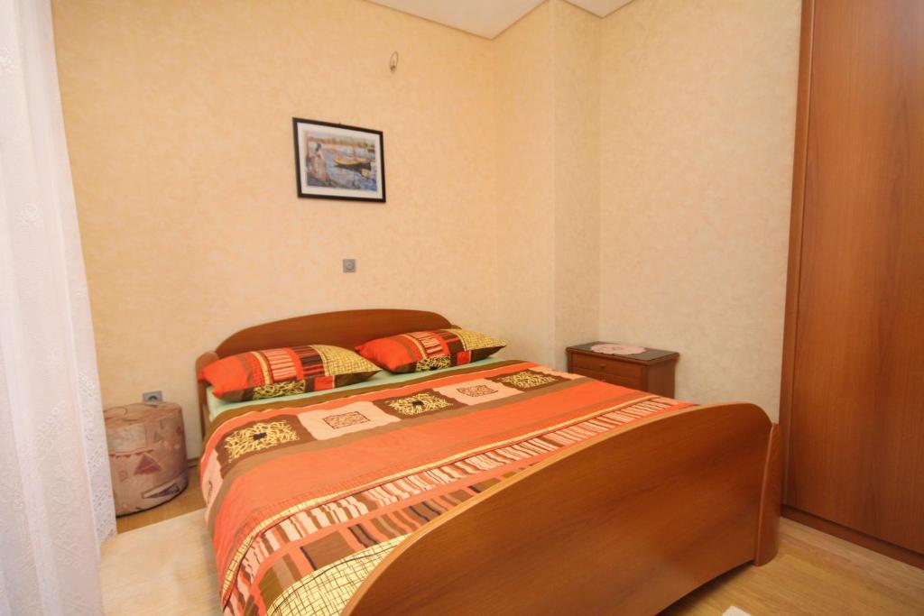 Posteľ alebo postele v izbe v ubytovaní Apartments by the sea Duce, Omis - 5973