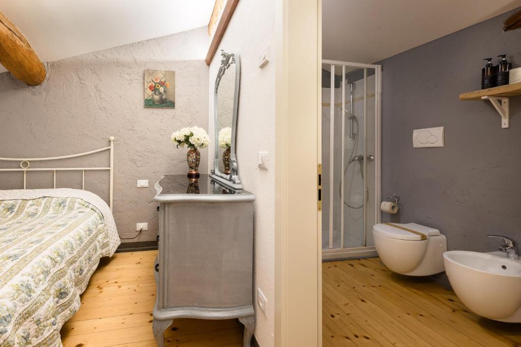 Postel nebo postele na pokoji v ubytování B&B Corte del Mincio