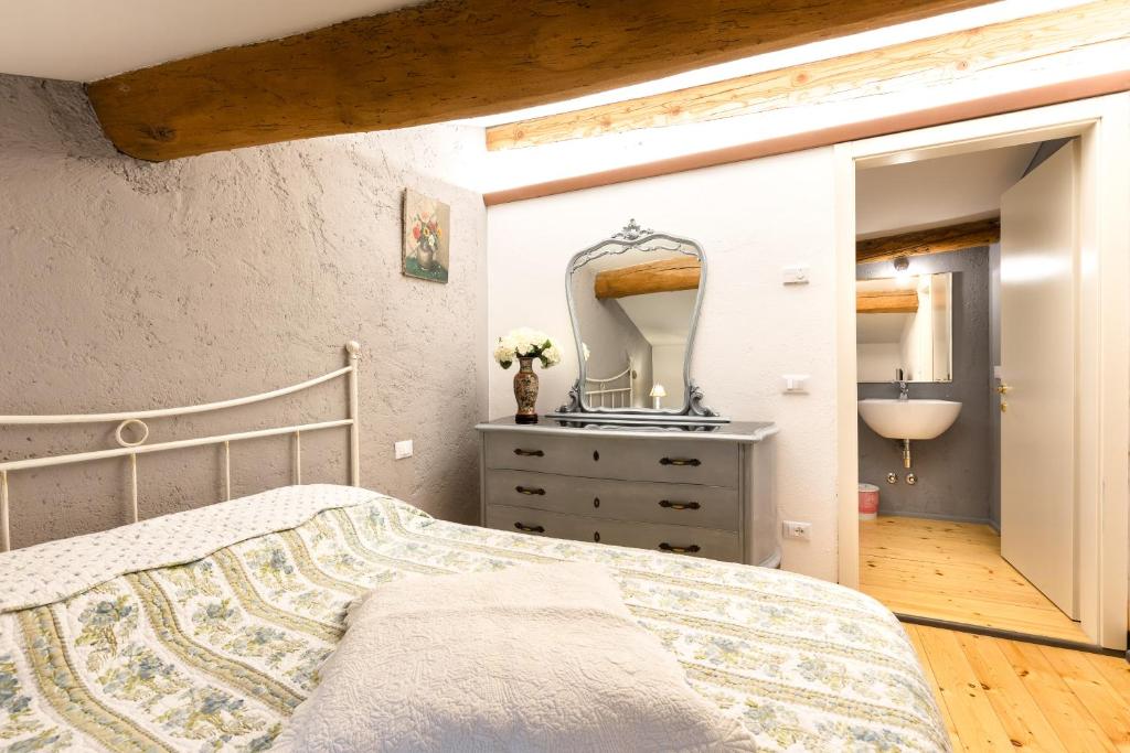 Postel nebo postele na pokoji v ubytování B&B Corte del Mincio
