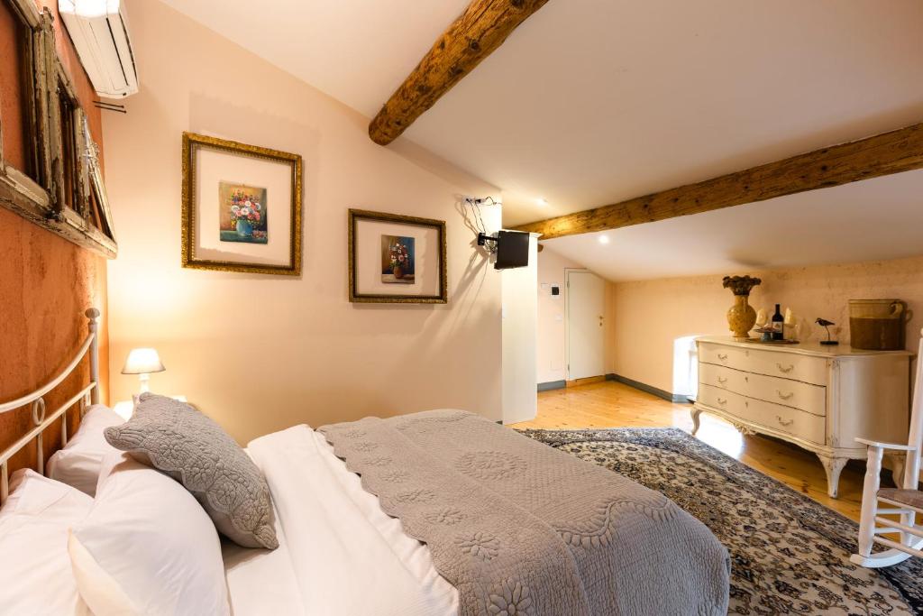 Postel nebo postele na pokoji v ubytování B&B Corte del Mincio