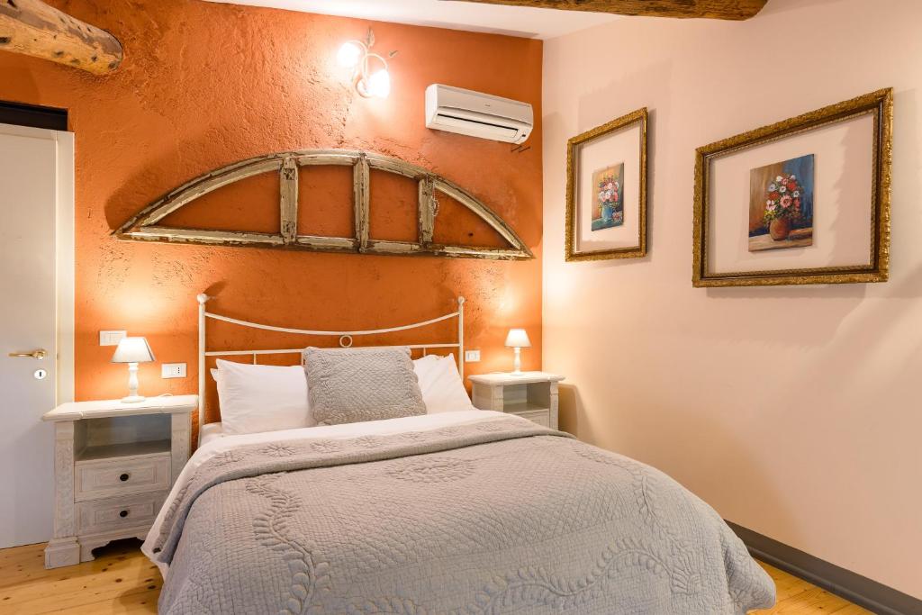 Postel nebo postele na pokoji v ubytování B&B Corte del Mincio