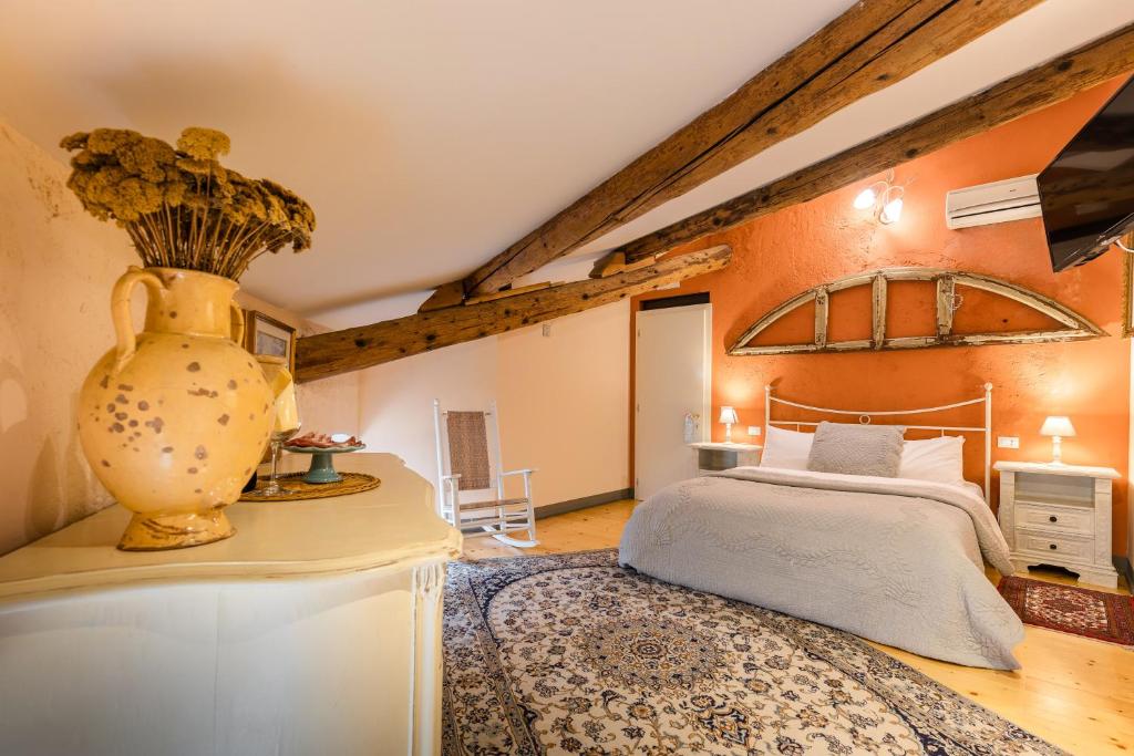 Postel nebo postele na pokoji v ubytování B&B Corte del Mincio