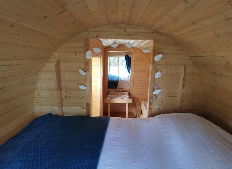 Postel nebo postele na pokoji v ubytování La Parenthèse Meslandaise