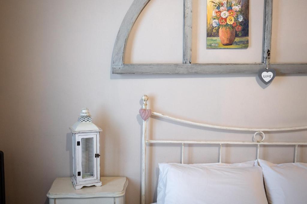 Postel nebo postele na pokoji v ubytování B&B Corte del Mincio