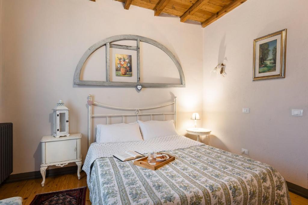 Postel nebo postele na pokoji v ubytování B&B Corte del Mincio