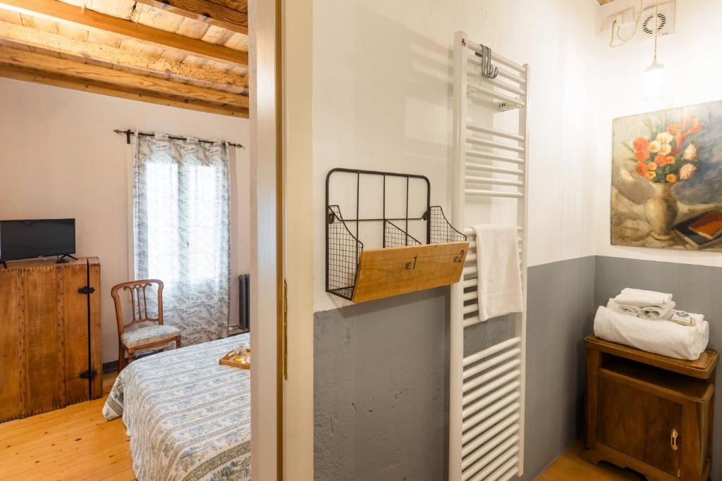 Postel nebo postele na pokoji v ubytování B&B Corte del Mincio