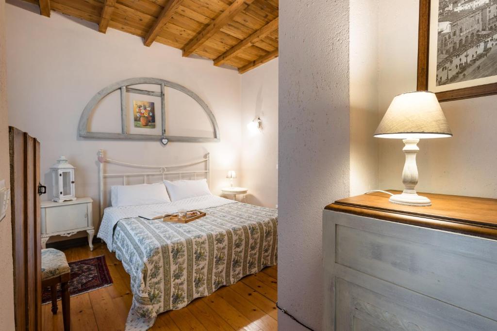 Postel nebo postele na pokoji v ubytování B&B Corte del Mincio
