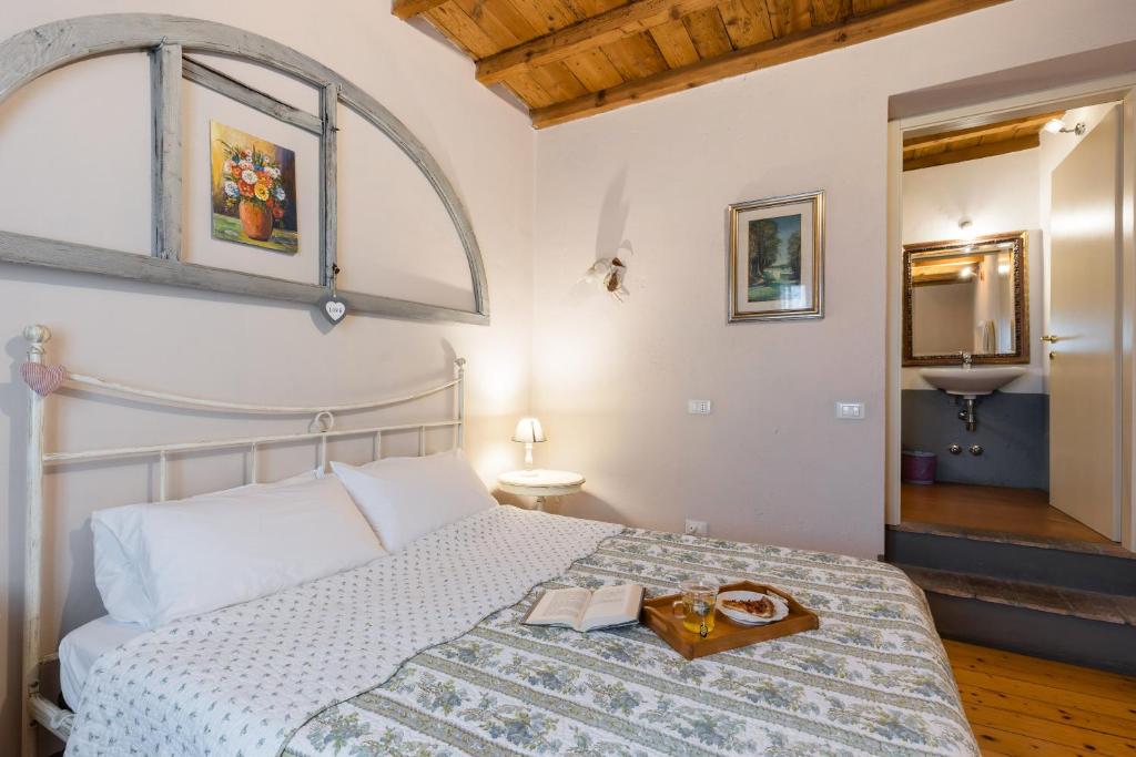 Postel nebo postele na pokoji v ubytování B&B Corte del Mincio
